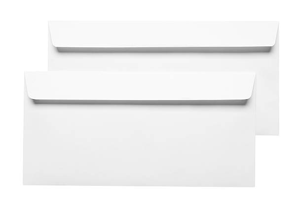 A stack of blank business envelopes with a cancelled U.S. flag stamp isolated on a white background with a soft shadow.