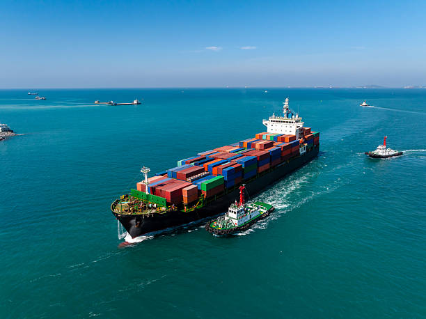 istock shipping cargo logistic, container ship carrying in sea import export goods and distributing products to dealer consumers across Asia pacific and worldwide global business transportation by container ship 2249505784