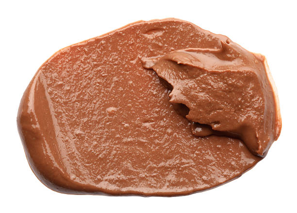 istock Sample of tasty nut butter isolated on white, top view 2249505877