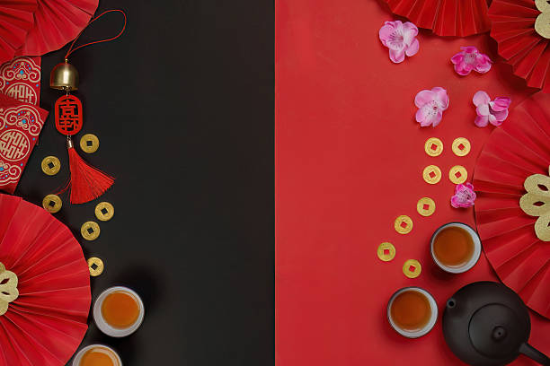 istock Chinese New Year background with tea and decorations, top view 2249509450
