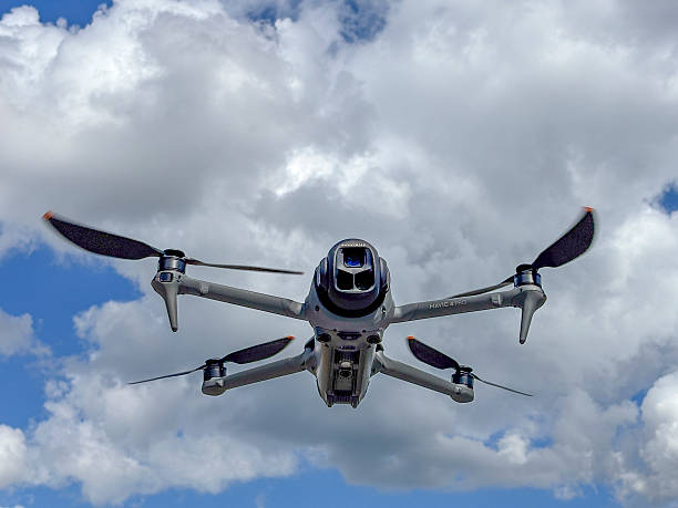 DJI Mavic 4 Pro drone flying in the air with the Hasselblad gimbal camera pointing forward. The Mavic 3 is a teleoperated quadcopter drone for aerial photography and videography mad by Chinese manufacturer DJI.