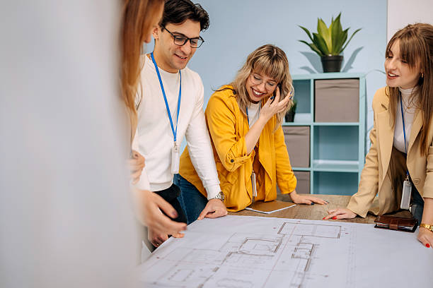 istock Group of architects working together 2249513787