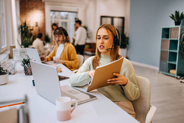 istock Customer support businesswoman working with headset 2249514013