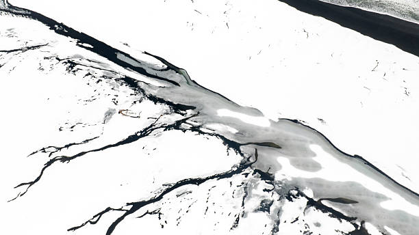 istock Stranded Boat on a Frozen River in Iceland 2249514044