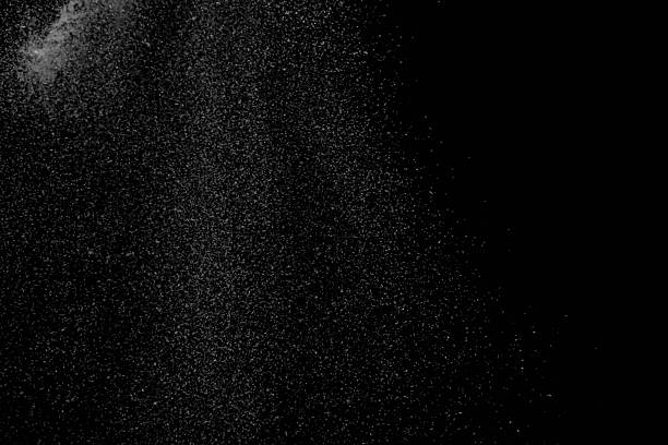 istock The falling white snow on a black background 2249516670