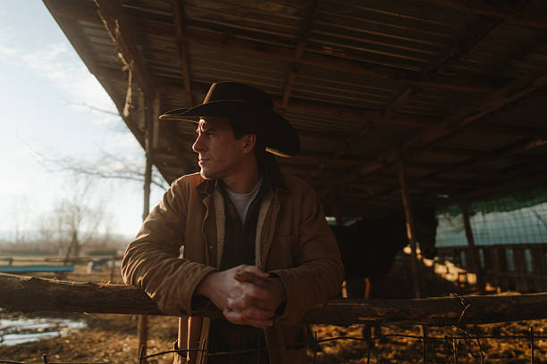 Portrait of a cowboy at his horse ranch