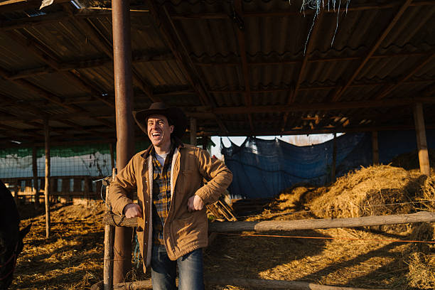 istock Cowboy at his horse ranch 2249520731