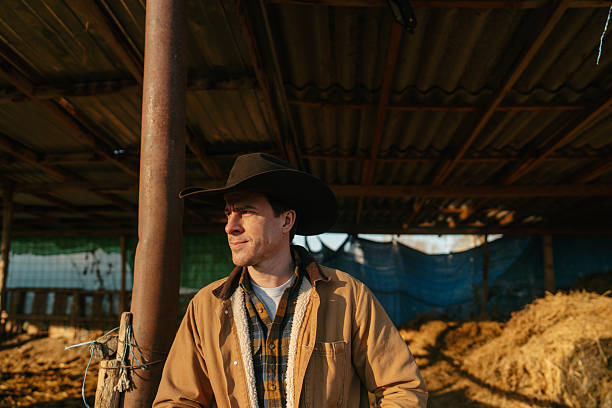 istock Cowboy at his horse ranch 2249520739