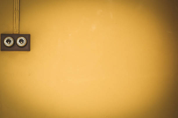 istock Vintage Bakelite Switch on a Textured Ochre Wall 2249530804