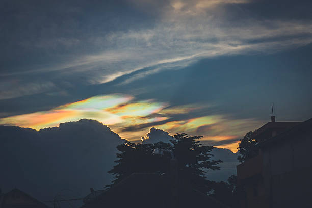 istock Rare Iridescent Pileus Clouds Glowing Above Dark Landscape 2249531356