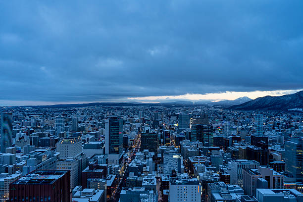 A softly glowing sunset view of Sapporo from the observation deck.