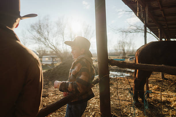 istock Daddy and me at the horse ranch 2249534522