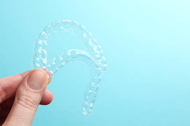 istock Aligners for straightening teeth on a blue background 2249544989