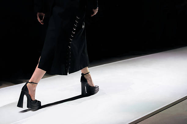 istock Stylish modern black outfit and high heels 2249545006