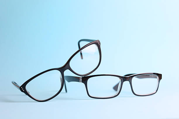 istock glasses for vision correction on a colored background with space for text 2249547311