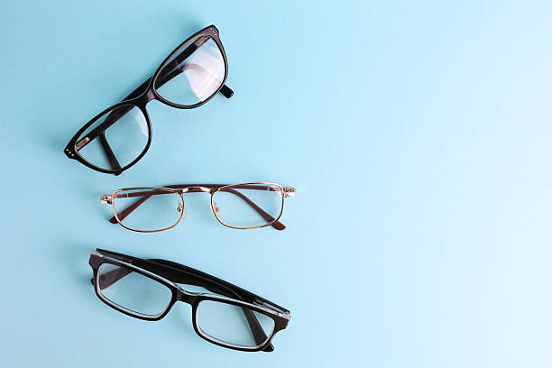 istock glasses for vision correction on a colored background with space for text 2249547347