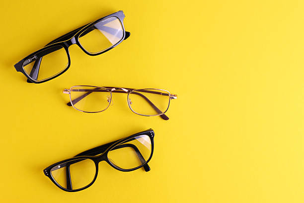 istock glasses for vision correction on a colored background with space for text 2249547375