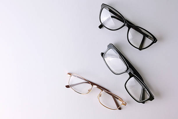 istock glasses for vision correction on a colored background with space for text 2249547747