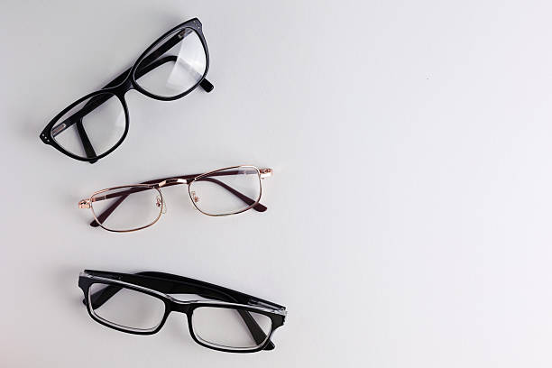 istock glasses for vision correction on a colored background with space for text 2249547930