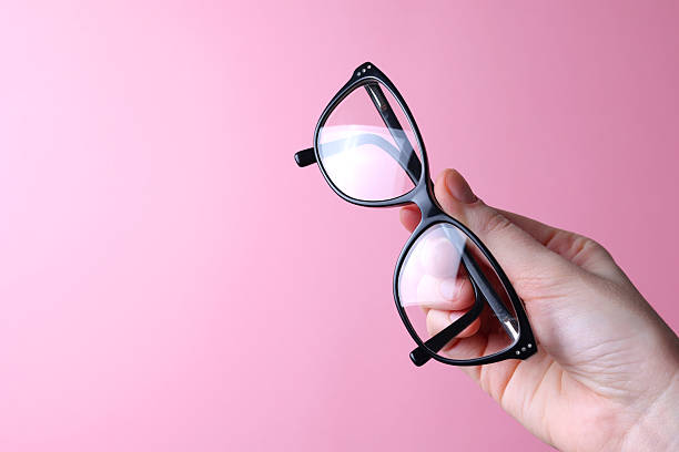 istock glasses for vision correction on a colored background with space for text 2249547941