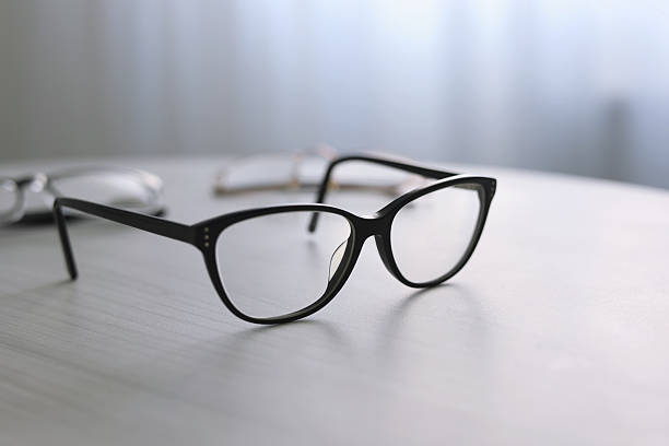 istock glasses for vision correction on a colored background with space for text 2249547943