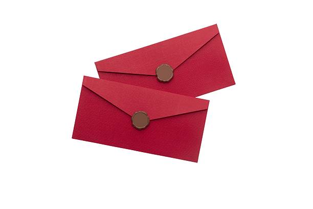 Two red envelopes with wax seals, overlapping, isolated on white background, top view, elegant and festive