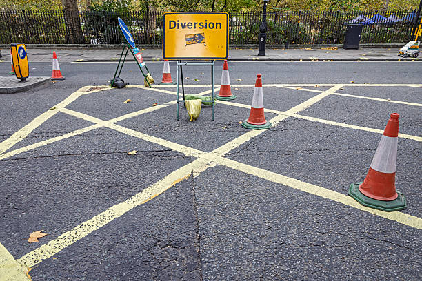 Russel Square, London, England, United Kingdom, Europe - November 4th 2025: Shaded asphalt area being cordoned off for major roadwork in central London.
