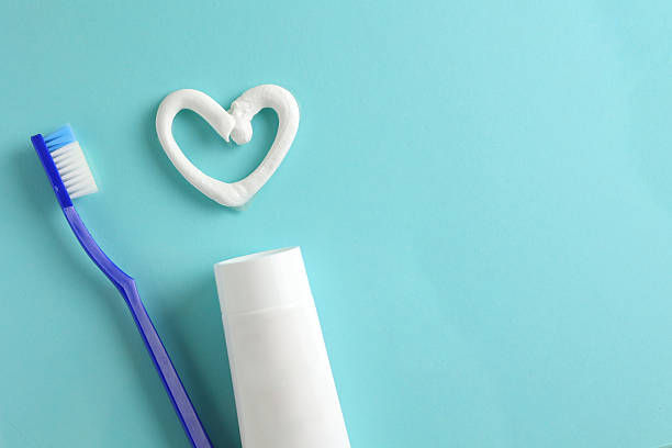 istock Toothpaste question mark on a colored background. Dental care, oral health. 2249548793