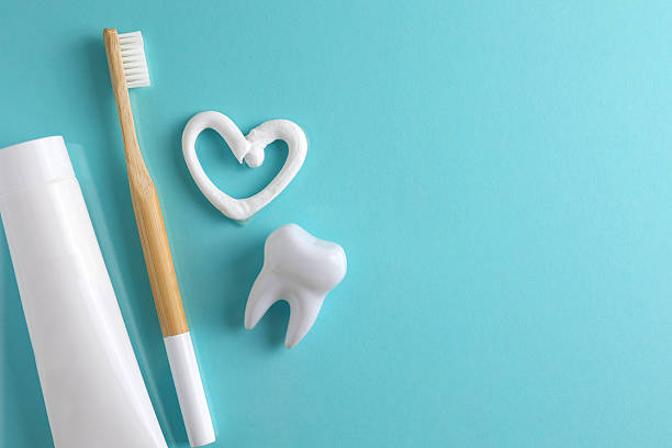 istock Toothpaste question mark on a colored background. Dental care, oral health. 2249548794