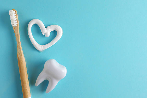 istock Toothpaste question mark on a colored background. Dental care, oral health. 2249548814