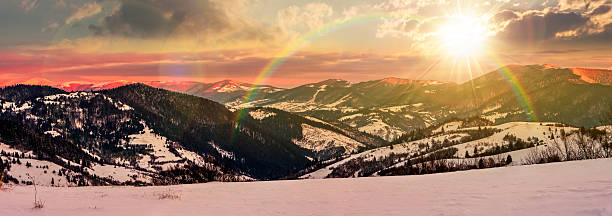 istock panorama of mountain ridge in winter at sunset 2249551707