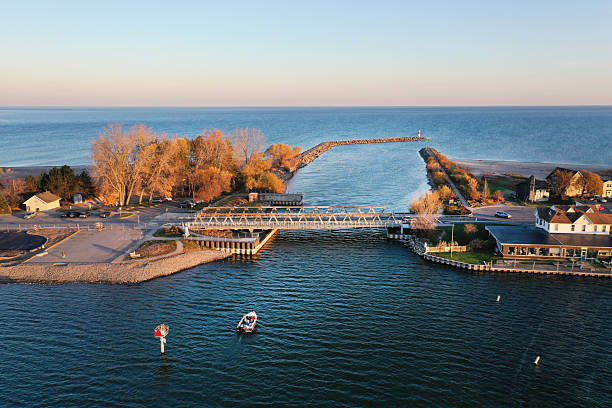 istock Irondequoit Bay Outlet Bridge, where the Genesee River meets Lake Ontario. 2249554091