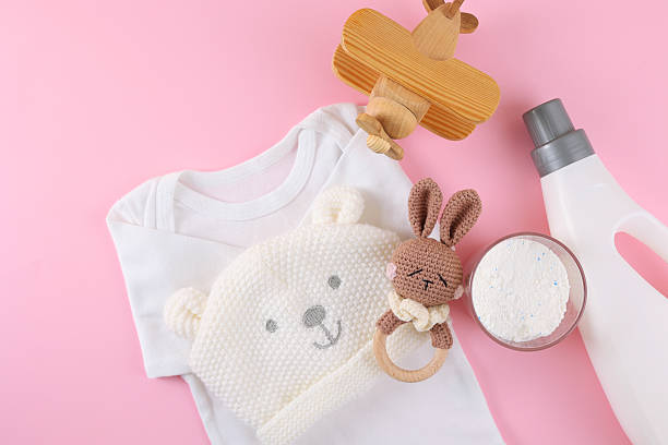 istock Laundry detergents for children's clothes and children's clothes 2249554393