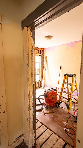 istock Residential construction zone, historic hurricane damaged Florida home undergoing renovation and restoration work. Damaged walls and floors from water and wind intrusion 2249555502
