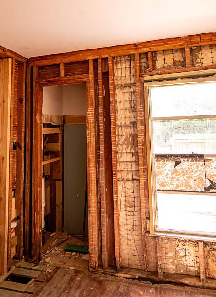 istock Residential construction zone, historic hurricane damaged Florida home undergoing renovation and restoration work. Damaged walls and floors from water and wind intrusion 2249555503