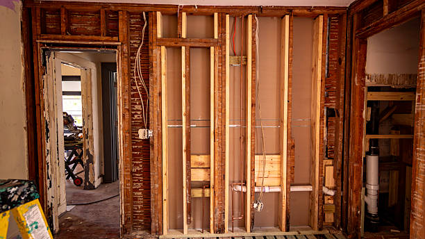 istock Residential construction zone, historic hurricane damaged Florida home undergoing renovation and restoration work. Damaged walls and floors from water and wind intrusion 2249555524