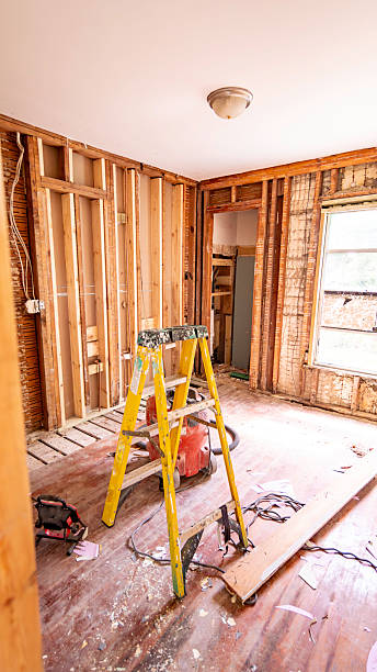 istock Residential construction zone, historic hurricane damaged Florida home undergoing renovation and restoration work. Damaged walls and floors from water and wind intrusion 2249555554