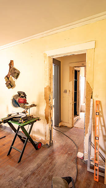 istock Residential construction zone, historic hurricane damaged Florida home undergoing renovation and restoration work. Damaged walls and floors from water and wind intrusion 2249555589