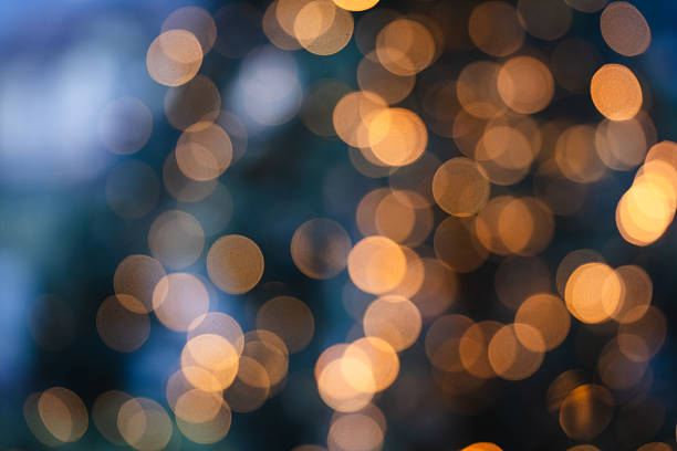 istock Warm golden christmas bokeh lights 2249562211