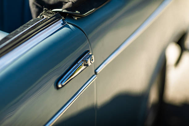 istock Chrome Door Handle Detail on Vintage Convertible 2249562507