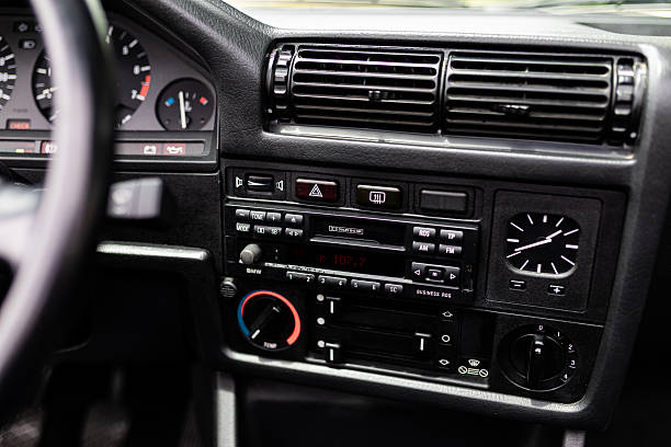 istock Classic Car Center Console with Radio and Analog Clock 2249562637