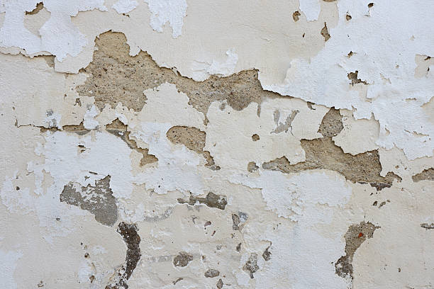 istock Texture of cracked and peeling plaster 2249564316