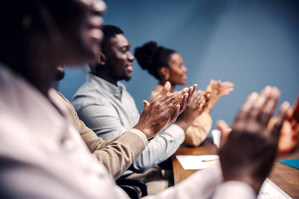 istock Business audience applauding during successful conference presentation 2249566761