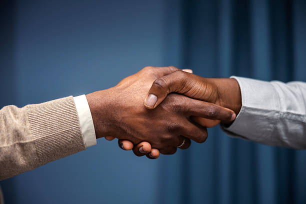 istock Business partners shaking hands making agreement 2249566829