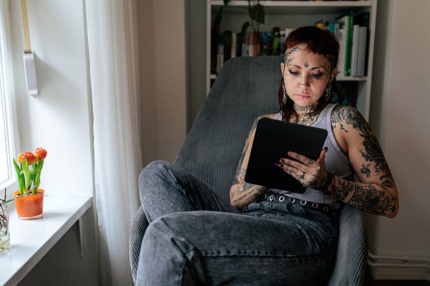 istock Woman Using a Digital Tablet and Stylus at Home 2249569727