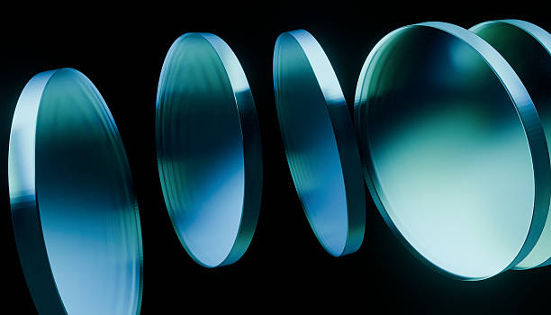 istock Translucent blue glass discs floating in dark space, creating futuristic and abstract visual effect 2249573042