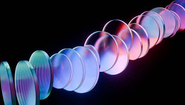istock Series of colorful, translucent discs arranged in spiral pattern against black background, creating futuristic and abstract visual 2249573057