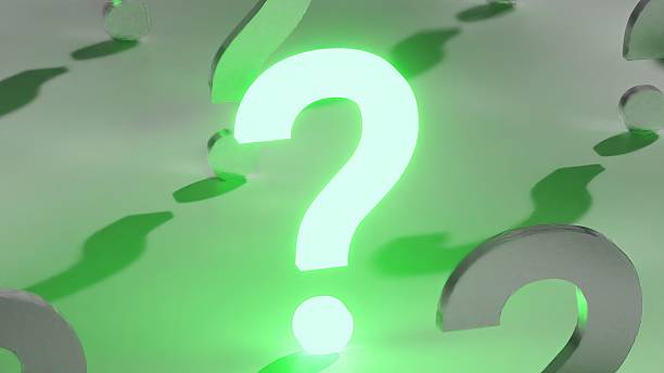 istock Infinite field of question marks with a single bright green glowing one moving through the crowd, representing finding an answer, solving a problem, or having a unique idea among many doubts 2249578180