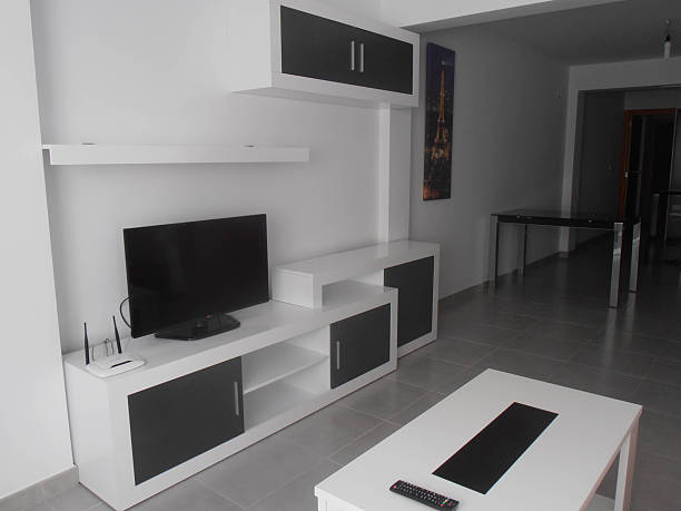 istock Modern Black and White Living Room with TV 2249578431