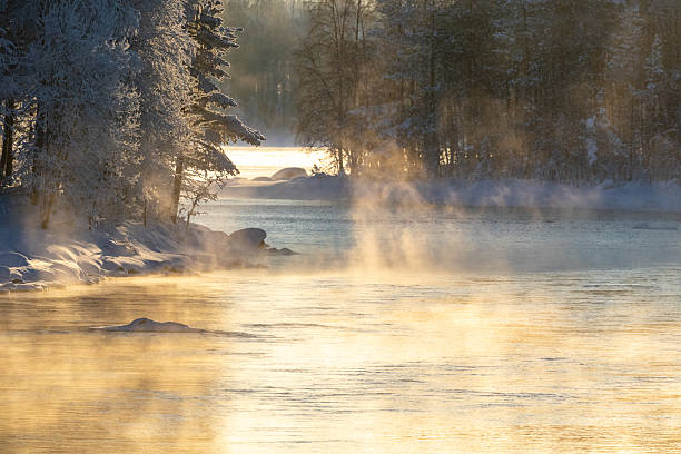 istock Steaming Kitkajoki river on a cold but sunny winter day 2249583422